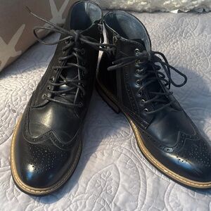 Elegant Black Leather Wingtip Boots